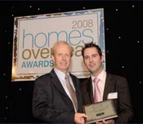 Andrew Neely accepting the award in London